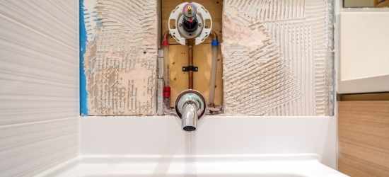 Who should do shower unblocking & repairs?